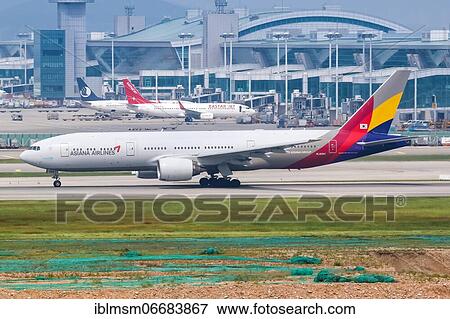 An Asiana Airlines Boeing 777-200ER with registration number HL8284 at Seoul Incheon International Airport (ICN) in South Korea View Large Photo Image Stock Photo - An Asiana Airlines Boeing 777-200ER with registration number HL8284 at Seoul Incheon International Airport (ICN) in South Korea. Fotosearch