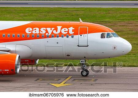 An EasyJet Airbus A320 with the registration G-EZWD at London Airport, United Kingdom, Europe View Large Photo Image Stock Photograph - An EasyJet Airbus A320 with the registration G-EZWD at London Airport, United Kingdom, Europe. Fotosearch