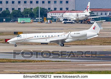 Stock Image - An Embraer 135BJ Legacy 650 aircraft of China Eastern Airlines Executive Air with registration number B-3293 at Shanghai Airport, China, Asia. Fotosearch