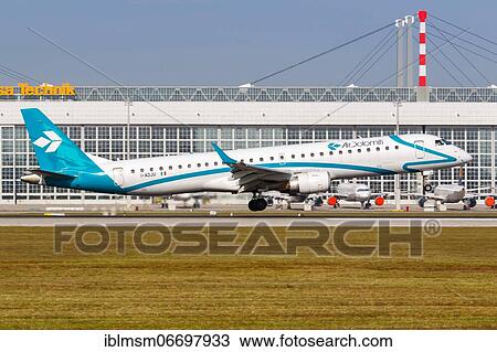 An Embraer ERJ 195 aircraft of Air Dolomiti with registration number I-ADJU at Munich Airport, Germany, Europe View Large Photo Image Stock Image - An Embraer ERJ 195 aircraft of Air Dolomiti with registration number I-ADJU at Munich Airport, Germany, Europe. Fotosearch
