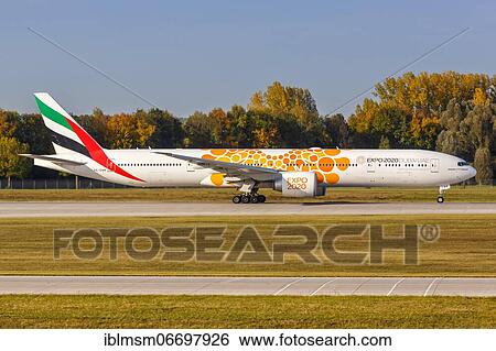 An Emirates Boeing 777-300ER aircraft with registration number A6-ENM and special livery EXPO 2020 Dubai at Munich Airport, Germany, Europe View Large Photo Image Stock Photograph - An Emirates Boeing 777-300ER aircraft with registration number A6-ENM and special livery EXPO 2020 Dubai at Munich Airport, Germany, Europe. Fotosearch