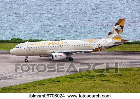 An Etihad Airbus A320 aircraft with registration A6-EIK at Mahe airport (SEZ), Seychelles, Africa View Large Photo Image Picture - An Etihad Airbus A320 aircraft with registration A6-EIK at Mahe airport (SEZ), Seychelles, Africa. Fotosearch