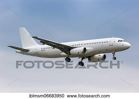 Stock Image - An Etihad Airways Airbus A320 with registration A6-EIC lands at London Heathrow Airport (LHR) in the United Kingdom. Fotosearch