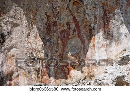 Stock Image - Ancient rock paintings in the Strait of (Iris), Triton Bay, West Papua, Indonesia, Asia. Fotosearch