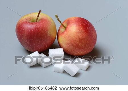 Apples and sugar cubes, apple, sugar consumption, white sugar, beet sugar View Large Photo Image Stock Image - Apples and sugar cubes, apple, sugar consumption, white sugar, beet sugar. Fotosearch