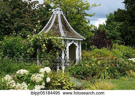Stock Photography - Arbour, Great Britain, Pavilion, Garden Cottage, Hailsham Grange Garden, Hailsham, East Sussex, England. Fotosearch