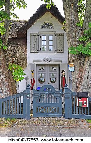 Artistic entrance, old Frisian house, thatched roof, Keitum, Sylt, North Frisian Islands, North Frisia, Schleswig-Holstein, Germany, Europe View Large Photo Image Stock Image - Artistic entrance, old Frisian house, thatched roof, Keitum, Sylt, North Frisian Islands, North Frisia, Schleswig-Holstein, Germany, Europe. Fotosearch