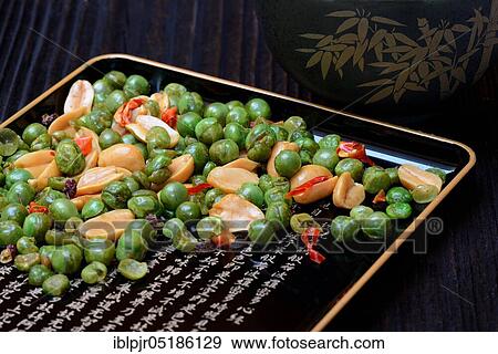 Asian snacks in shell, peanuts, green peas, chili View Large Photo Image Stock Photo - Asian snacks in shell, peanuts, green peas, chili. Fotosearch