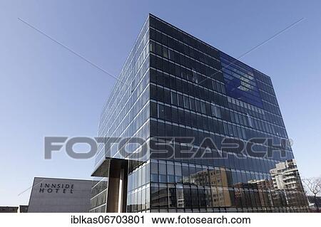 Avant-garde office building Cubus and Hotel Innside, Business Quartier Seestern, Düsseldorf, North Rhine-Westphalia, Germany, Europe View Large Photo Image Stock Image - Avant-garde office building Cubus and Hotel Innside, Business Quartier Seestern, Düsseldorf, North Rhine-Westphalia, Germany, Europe. Fotosearch