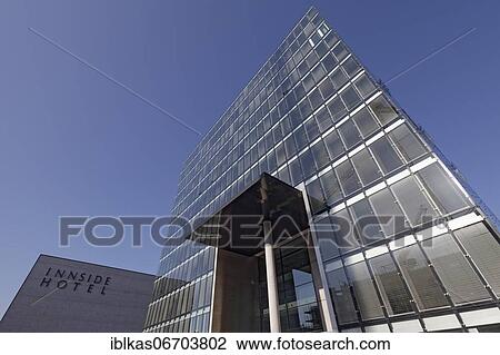Avant-garde office building Cubus and Hotel Innside, Business Quartier Seestern, Düsseldorf, North Rhine-Westphalia, Germany, Europe View Large Photo Image Stock Image - Avant-garde office building Cubus and Hotel Innside, Business Quartier Seestern, Düsseldorf, North Rhine-Westphalia, Germany, Europe. Fotosearch