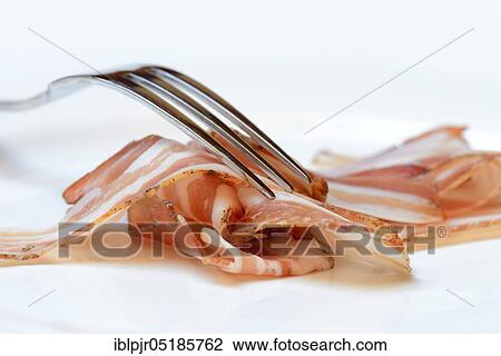 Bacon with fork, bacon strips, breakfast bacon View Large Photo Image Stock Image - Bacon with fork, bacon strips, breakfast bacon. Fotosearch