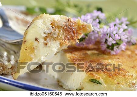 Baked sheep cheese with thyme View Large Photo Image Stock Photography - Baked sheep cheese with thyme. Fotosearch