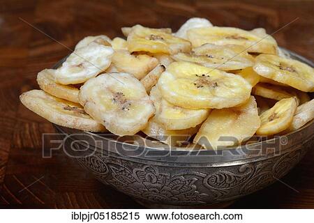 Banana chips, banana chips View Large Photo Image Stock Photography - Banana chips, banana chips. Fotosearch