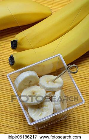 Banana slices in peel and bananas View Large Photo Image Stock Photo - Banana slices in peel and bananas. Fotosearch