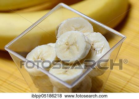 Stock Photo - Banana slices in peel and bananas. Fotosearch