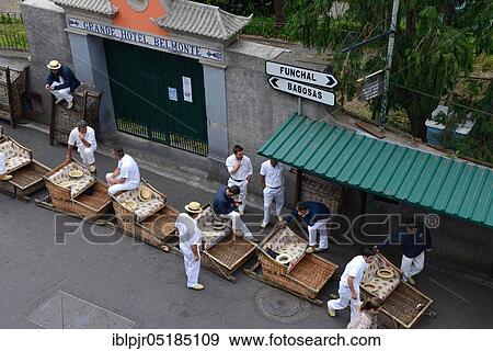 Stock Photo - Basket sledge drivers waiting for customers, Funchal, Monte, Madeira, Portugal, Europe. Fotosearch