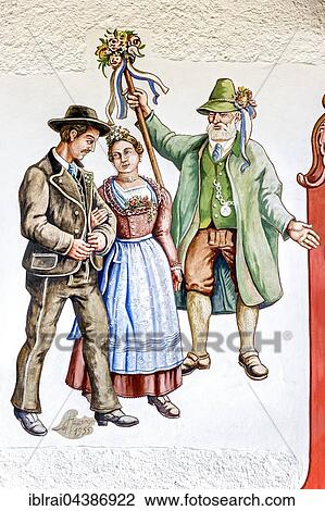 Stock Image - Bavarian Lüftlmalerei, rural scene of a wedding, old townhall, Bayrischzell, Upper Bavaria, Bavaria, Germany, Europe. Fotosearch