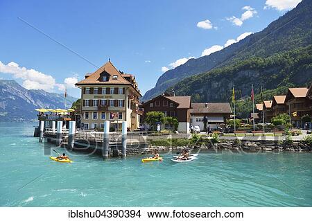 Picture - Beach hotel with jetty, Iseltwald, Lake Brienz, Canton of Bern, Switzerland, Europe. Fotosearch