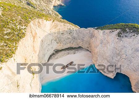 Beach with shipwreck, drone shot, Navagio Beach, Zakynthos, Greece, Europe View Large Photo Image Picture - Beach with shipwreck, drone shot, Navagio Beach, Zakynthos, Greece, Europe. Fotosearch