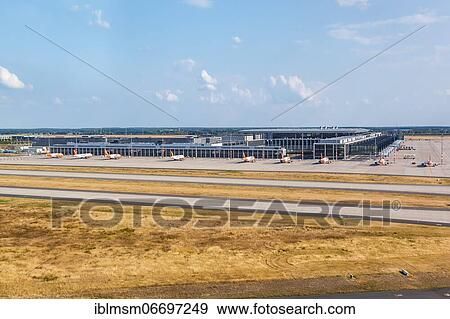 Berlin Brandenburg BER Airport Terminal North Pier Aerial View in Berlin, Germany, Europe View Large Photo Image Stock Photo - Berlin Brandenburg BER Airport Terminal North Pier Aerial View in Berlin, Germany, Europe. Fotosearch