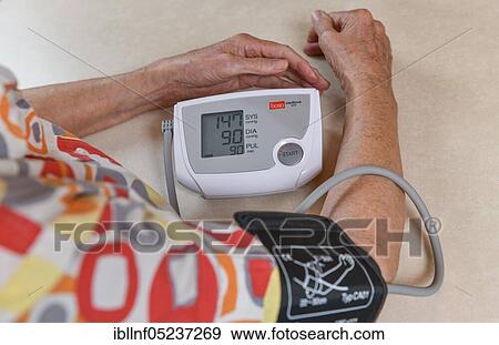 Blood pressure measurement, senior citizen View Large Photo Image Stock Photo - Blood pressure measurement, senior citizen. Fotosearch