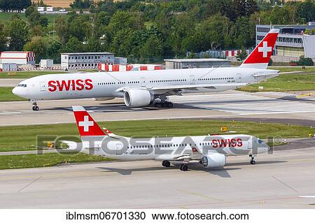 Boeing 777-300ER and Airbus A220-300 aircraft of Swiss at Zurich Airport, Switzerland, Europe View Large Photo Image Stock Image - Boeing 777-300ER and Airbus A220-300 aircraft of Swiss at Zurich Airport, Switzerland, Europe. Fotosearch