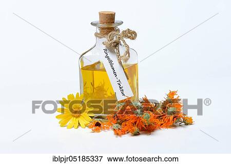 Stock Photo - Bottle with -tincture, Marigoldstincture. Fotosearch