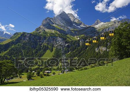 Stock Image - Braunwald Sportbahnen, Ortstock in the background, Glarus, Glarner Berge, Switzerland, Europe. Fotosearch