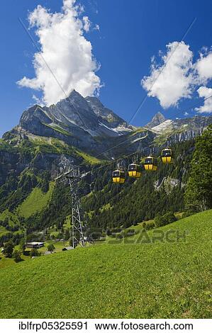 Braunwald Sportbahnen, Ortstock in the background, Glarus, Glarner Berge, Switzerland, Europe View Large Photo Image Stock Image - Braunwald Sportbahnen, Ortstock in the background, Glarus, Glarner Berge, Switzerland, Europe. Fotosearch