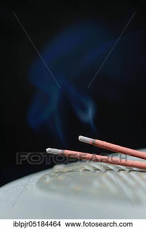 Bruning Incense Sticks View Large Photo Image Picture - Bruning Incense Sticks. Fotosearch