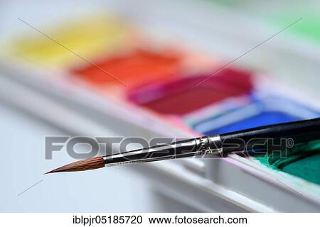 Stock Image - Brushes and watercolours. Fotosearch