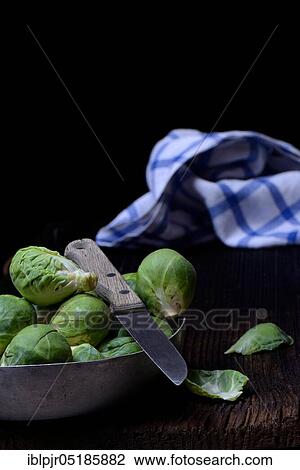 Brussels sprouts in bowl with kitchen knife ( Braßica oleracea gemmifera) View Large Photo Image Stock Image - Brussels sprouts in bowl with kitchen knife ( Braßica oleracea gemmifera). Fotosearch