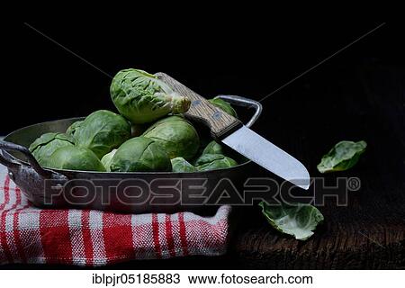 Brussels sprouts in bowl with kitchen knife ( Braßica oleracea gemmifera) View Large Photo Image Stock Image - Brussels sprouts in bowl with kitchen knife ( Braßica oleracea gemmifera). Fotosearch