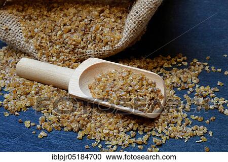 Stock Image - Bulgur, pre-cooked durum wheat, durum wheat semolina, bulgur wheat, wheat groats. Fotosearch