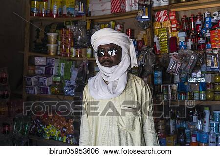 Business man in is shop, Unesco world heritage, Ennedi plateau, Chad, Africa View Large Photo Image Stock Photograph - Business man in is shop, Unesco world heritage, Ennedi plateau, Chad, Africa. Fotosearch