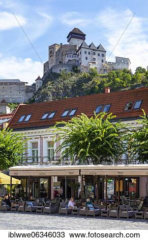 Cafés on Peace Square with Trencin Castle, Trencin, Slovakia, Europe View Large Photo Image Stock Image - Cafés on Peace Square with Trencin Castle, Trencin, Slovakia, Europe. Fotosearch