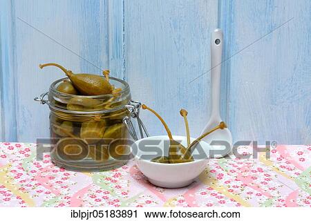 Caper, caper apples in glass and bowl (Capparis spinosa), caper fruit, caper fruits View Large Photo Image Stock Image - Caper, caper apples in glass and bowl (Capparis spinosa), caper fruit, caper fruits. Fotosearch