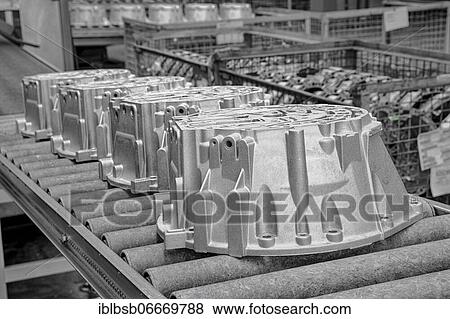 Car parts on a conveyor belt in a car parts factory, Laupheim, Baden-Württemberg, Germany, Europe View Large Photo Image Stock Photo - Car parts on a conveyor belt in a car parts factory, Laupheim, Baden-Württemberg, Germany, Europe. Fotosearch