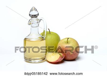 Carafe with apple vinegar and apples View Large Photo Image Stock Image - Carafe with apple vinegar and apples. Fotosearch