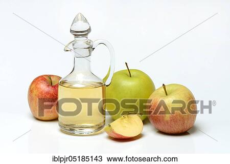 Carafe with apple vinegar and apples View Large Photo Image Stock Image - Carafe with apple vinegar and apples. Fotosearch