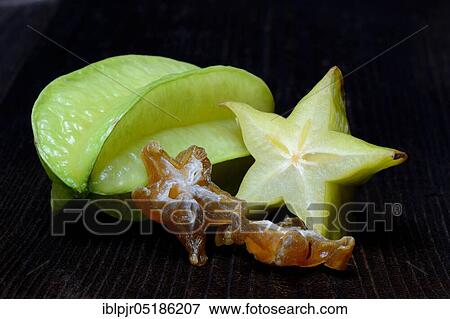 Stock Photo - Carambola ( Averrhoa carambola) fresh fruit sliced and dried fruit. Fotosearch