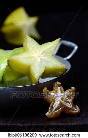Stock Photo - Carambola ( Averrhoa carambola) fresh fruit sliced and dried fruit. Fotosearch