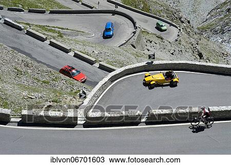 Cars and cyclists on the Stelvio Pass, South Tyrol, Italy, Europe View Large Photo Image Stock Image - Cars and cyclists on the Stelvio Pass, South Tyrol, Italy, Europe. Fotosearch
