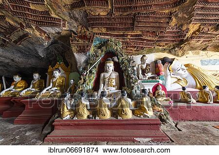 Picture - Cave filled with buddhas, Kawgun cave, Hpa-An, Kayin state, Myanmar, Asia. Fotosearch