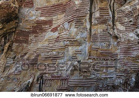Stock Photo - Cave filled with buddhas, Kawgun cave, Hpa-An, Kayin state, Myanmar, Asia. Fotosearch