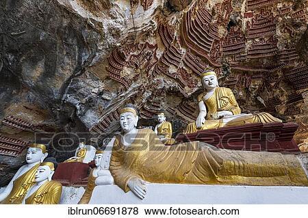 Cave filled with buddhas, Kawgun cave, Hpa-An, Kayin state, Myanmar, Asia View Large Photo Image Stock Photo - Cave filled with buddhas, Kawgun cave, Hpa-An, Kayin state, Myanmar, Asia. Fotosearch