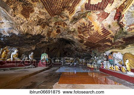 Stock Photography - Cave filled with buddhas, Kawgun cave, Hpa-An, Kayin state, Myanmar, Asia. Fotosearch