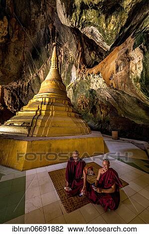 Stock Image - Cave filled with buddhas, Yathaypyan cave, Hpa-An, Kayin state, Myanmar, Asia. Fotosearch