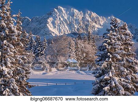 Stock Image - Chapel Maria Rast on the Buckelwiesen with Wörner 2474m in the Karwendel Mountains, Krün, Werdenfelser Land, Upper Bavaria, Bavaria, Germany, Europe. Fotosearch