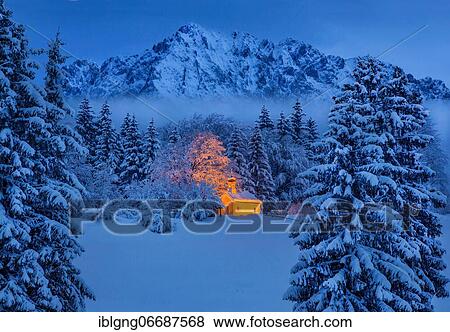 Chapel Maria Rast on the Buckelwiesen with Wörner 2474m in the Karwendel mountains at dusk, Krün, Werdenfelser Land, Upper Bavaria, Bavaria, Germany, Europe View Large Photo Image Stock Photo - Chapel Maria Rast on the Buckelwiesen with Wörner 2474m in the Karwendel mountains at dusk, Krün, Werdenfelser Land, Upper Bavaria, Bavaria, Germany, Europe. Fotosearch
